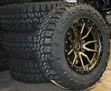 20x9 FUEL REBEL w/ NITTO Trail Grappler 35" tires (Satin Bronze w/ Black Lip)